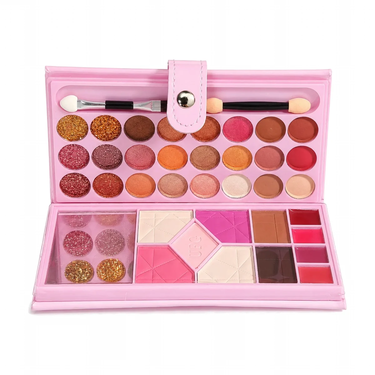 A pink makeup palette shown open on a white background, containing multiple round and square eyeshadow pans in pink, red, orange, brown, and glitter shades, plus two small applicators and a small mirror.