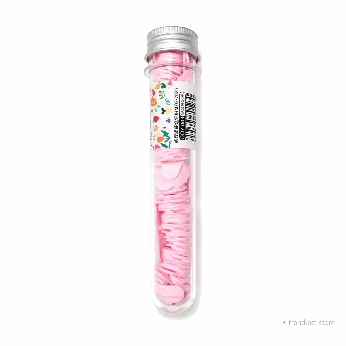 A clear plastic test tube with a silver metal cap, filled with pink heart-shaped wax melts. A colorful decorative label with a barcode is wrapped around the middle of the tube, set against a plain white background.