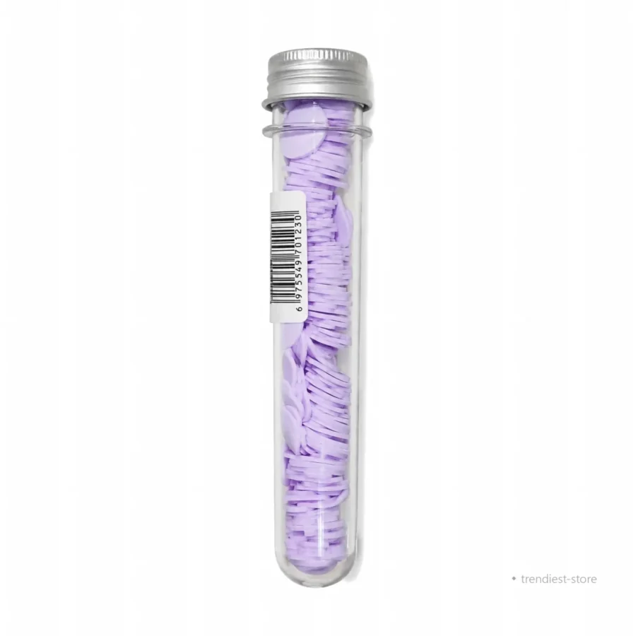 A clear cylindrical plastic tube with a silver metal screw cap, filled with many small lavender-purple oval pieces, shown on a plain white background. A barcode label is attached on the side.