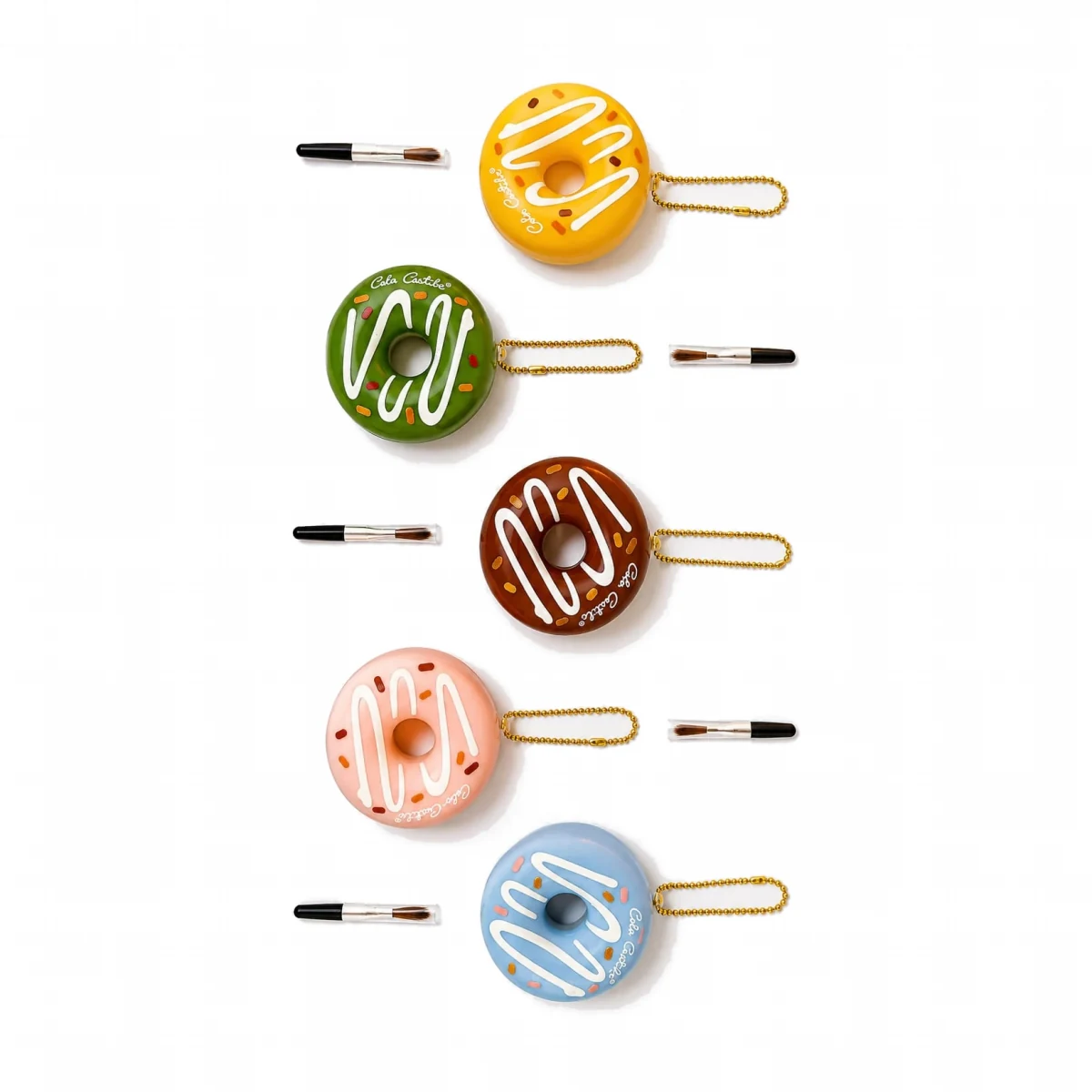 Donut-shaped moisturizing lip balm in five donut shades with lip brushes