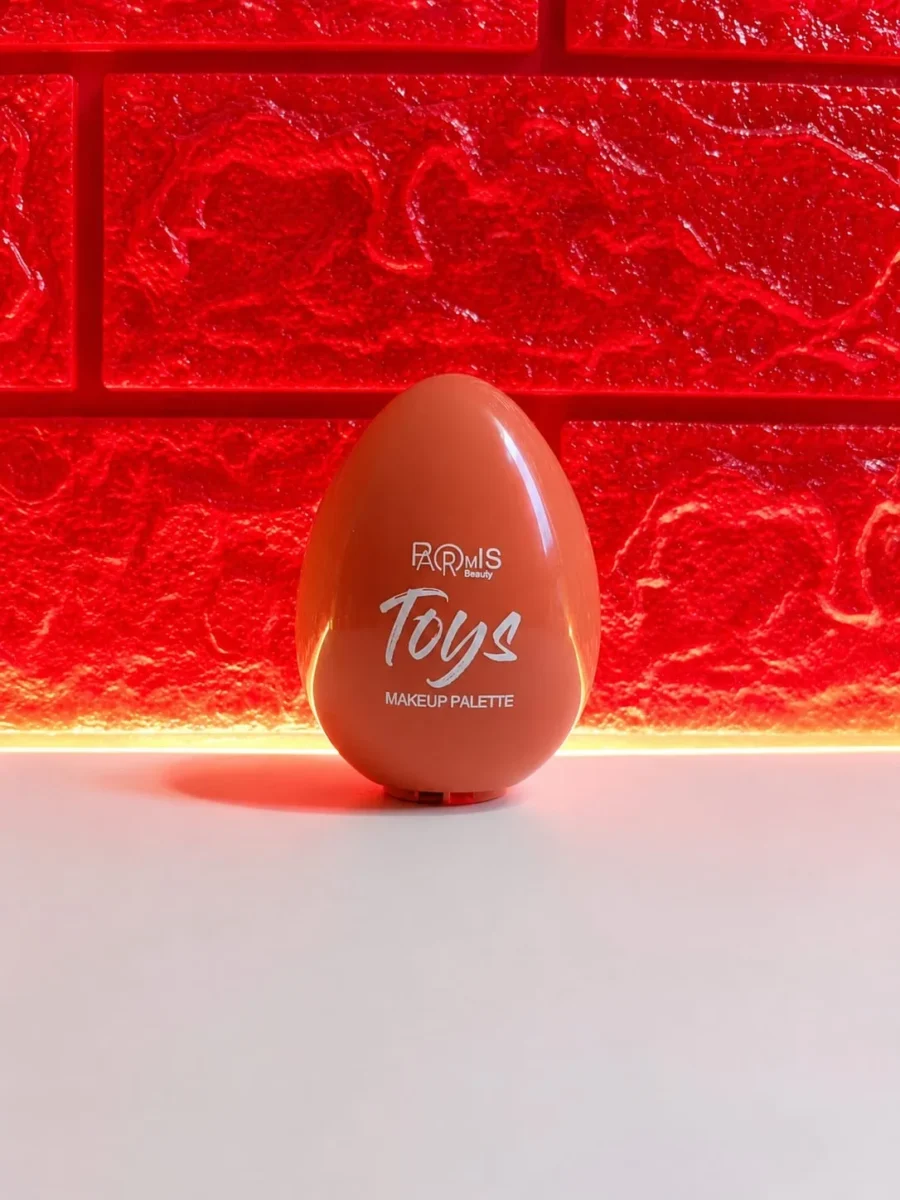 Coral egg shaped makeup palette compact standing closed
