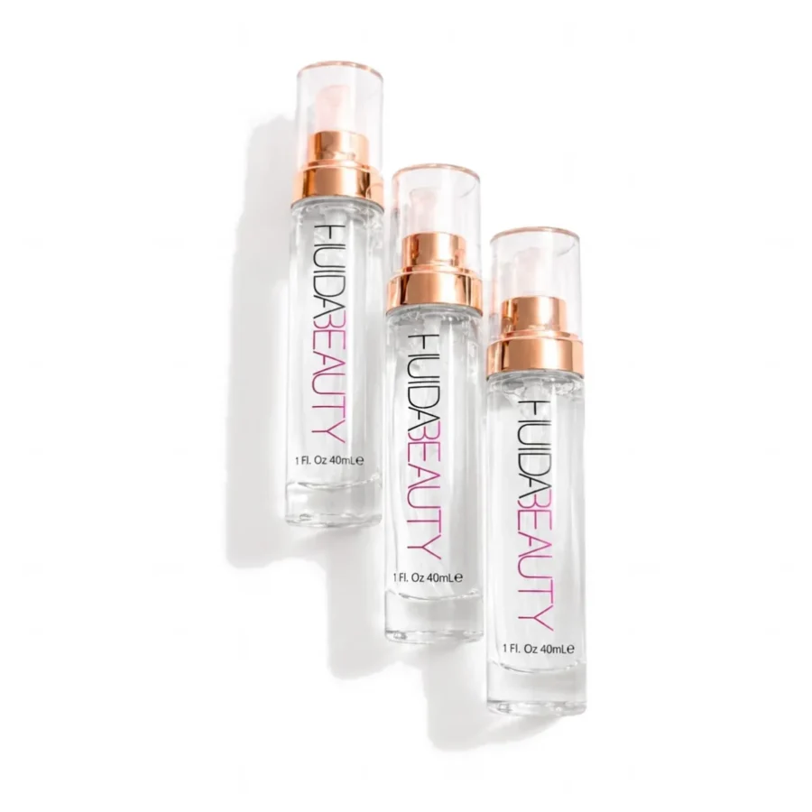 Three bottles of 40ml face primer laid on a white surface