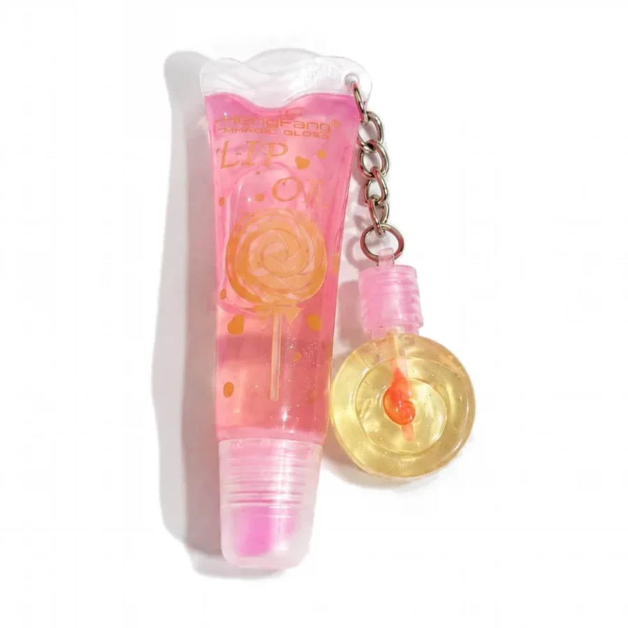 Lollipop lip oil in peach shade with yellow lollipop keychain charm