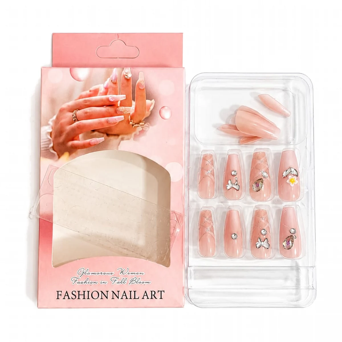 Press-on nails in blush nude with crystals and a daisy