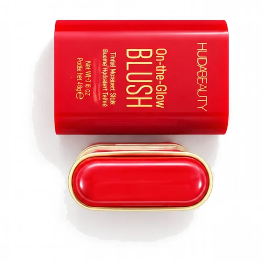 On-the-Glow Blush stick in cherry red, laid flat