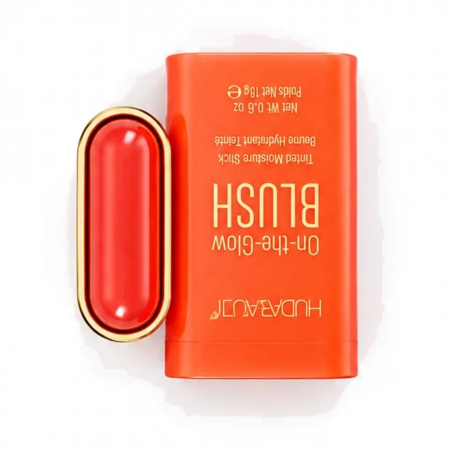 On-the-Glow Blush stick in bright coral orange