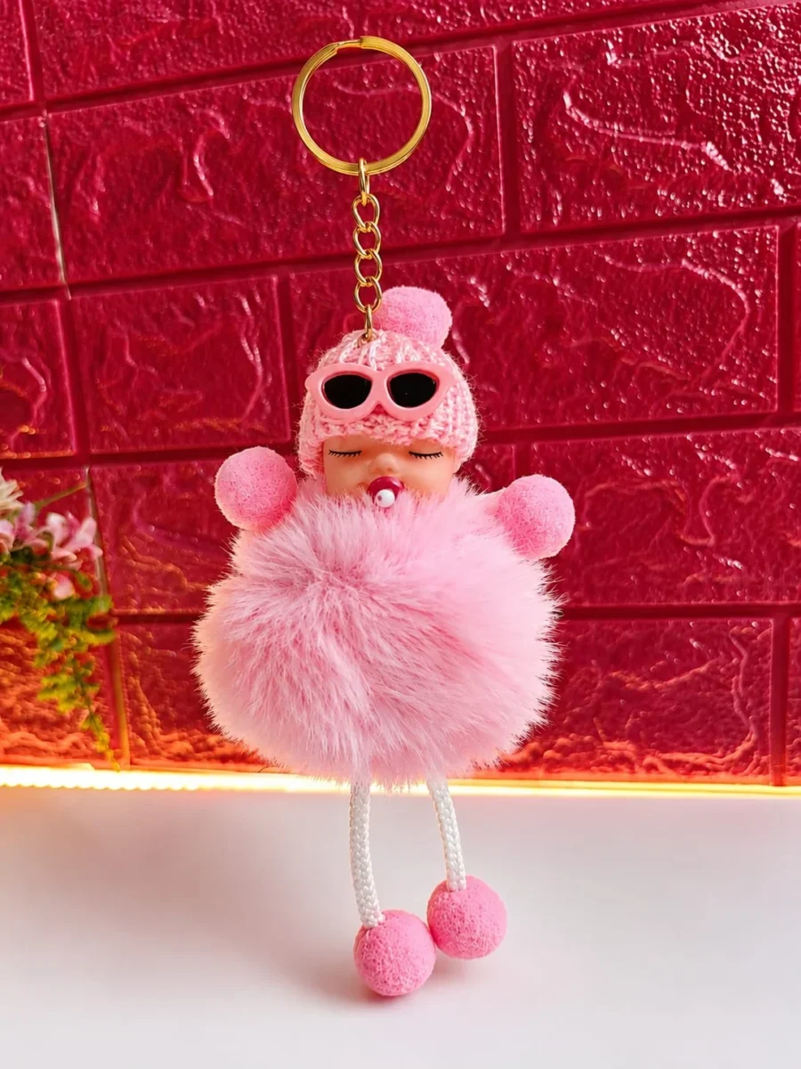 Pink sleeping baby doll pom pom keychain with knitted hat and sunglasses